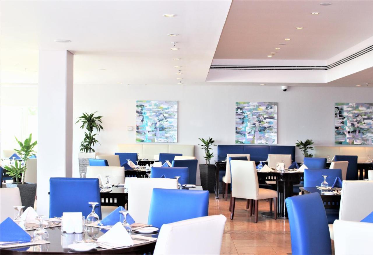Mövenpick Hotel&Resort Al Bida'a Salmiya Kültér fotó The restaurant